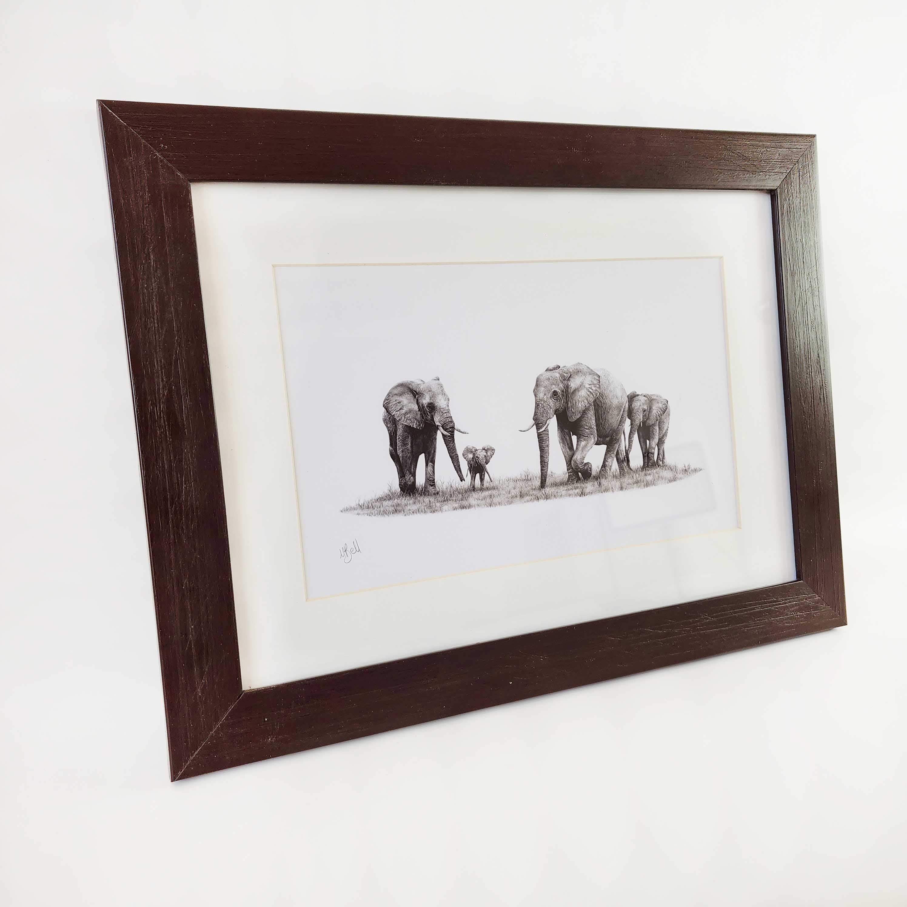 African elephants family artwork with a brown frame