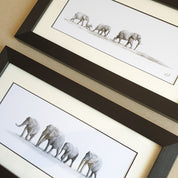 Elephant herd drawings with a frame by Matthew Bell