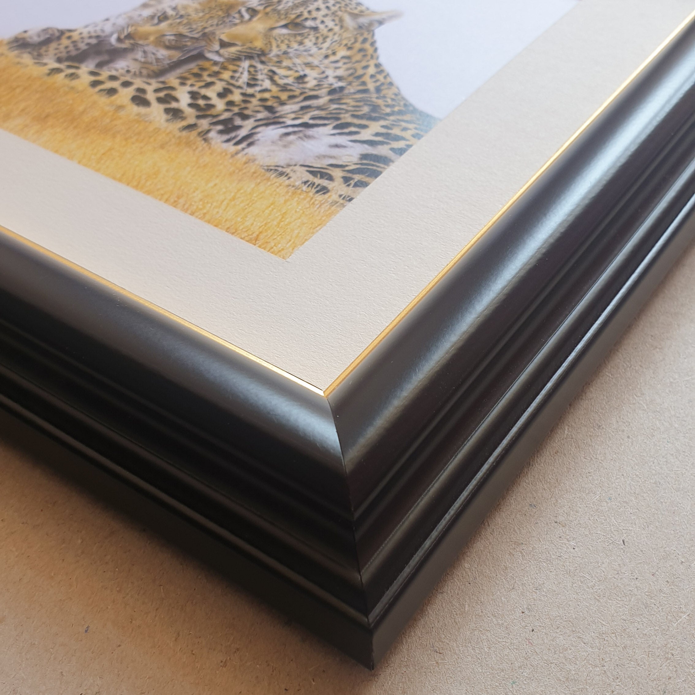 African wildlife art, leopard mother with a cub in a black frame