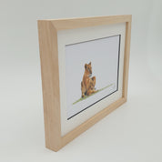 African lioness with a cub framed artwork with natural wood frame