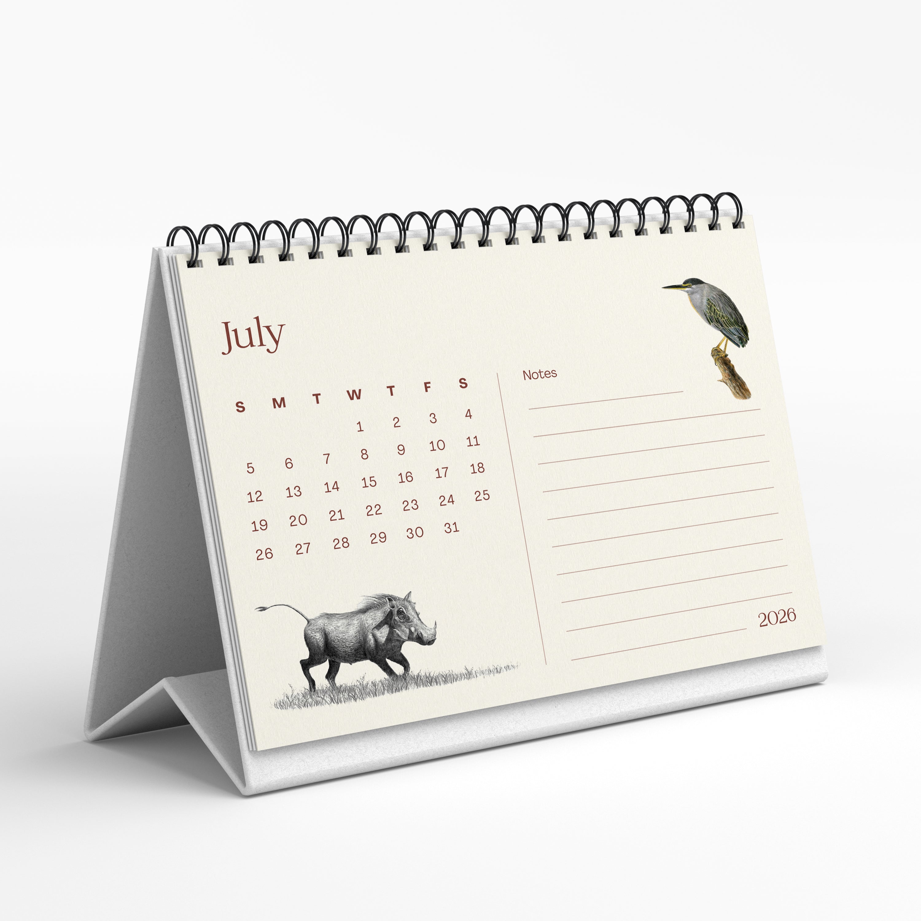 Tabletop calendar for July 2020 with illustrations on a white background