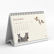 Desk calendar for November 2020 with zebra and bird design on a white background