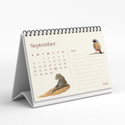 Tabletop calendar for September 2020 with a leopard illustration on a white background