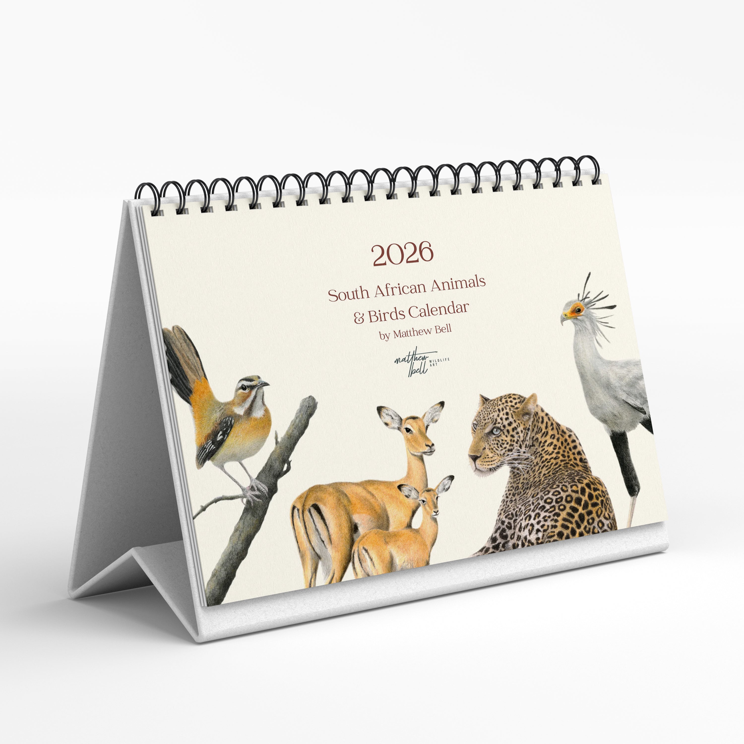 2026 South African Animals & Birds calendar with illustrations of a leopard, birds, and antelopes on a white background.