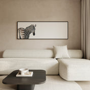 Framed zebra canvas print combining detailed safari-inspired artwork with a sophisticated contemporary frame.