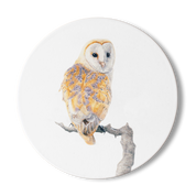 Round wooden coaster with a drawing of a barn owl and a white background