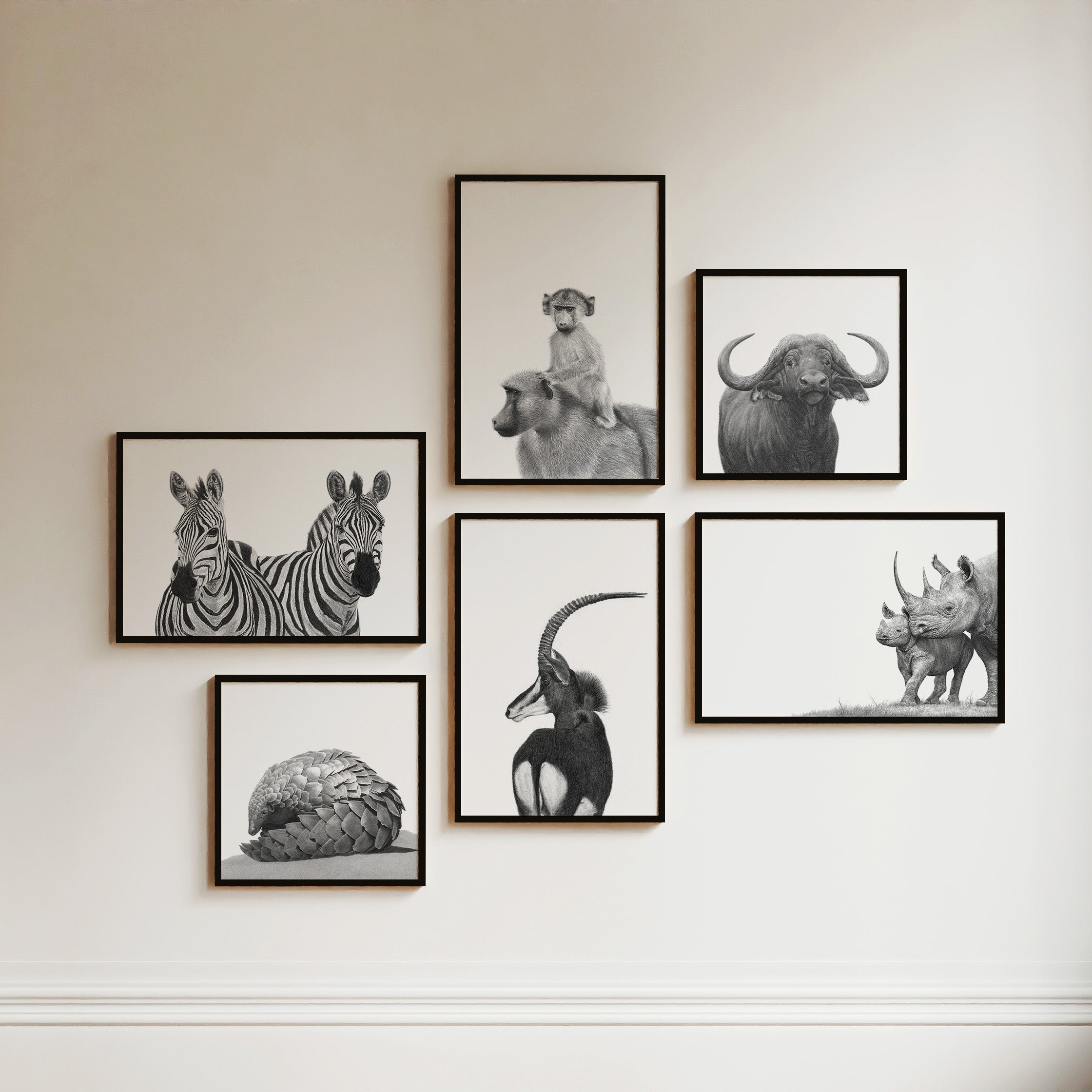 Six African wildlife prints by Matthew Bell featuring baboons, buffalo, sable antelope, pangolin and zebras