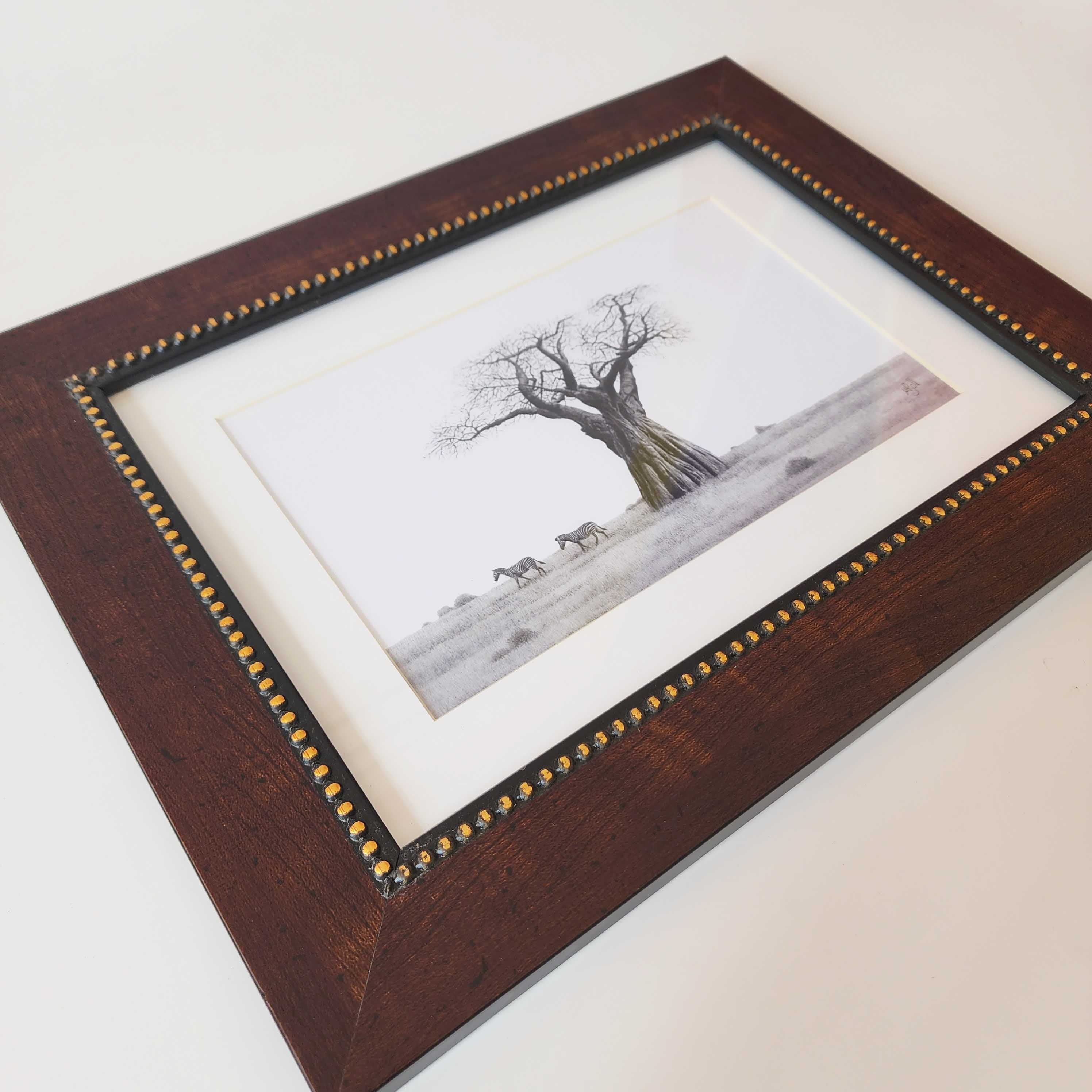 Artwork of an African Baobab Tree and Zebras with a wooden frame, by famous wildlife nature artist Matthew Bell