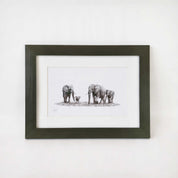 African elephants family artwork with a brown frame