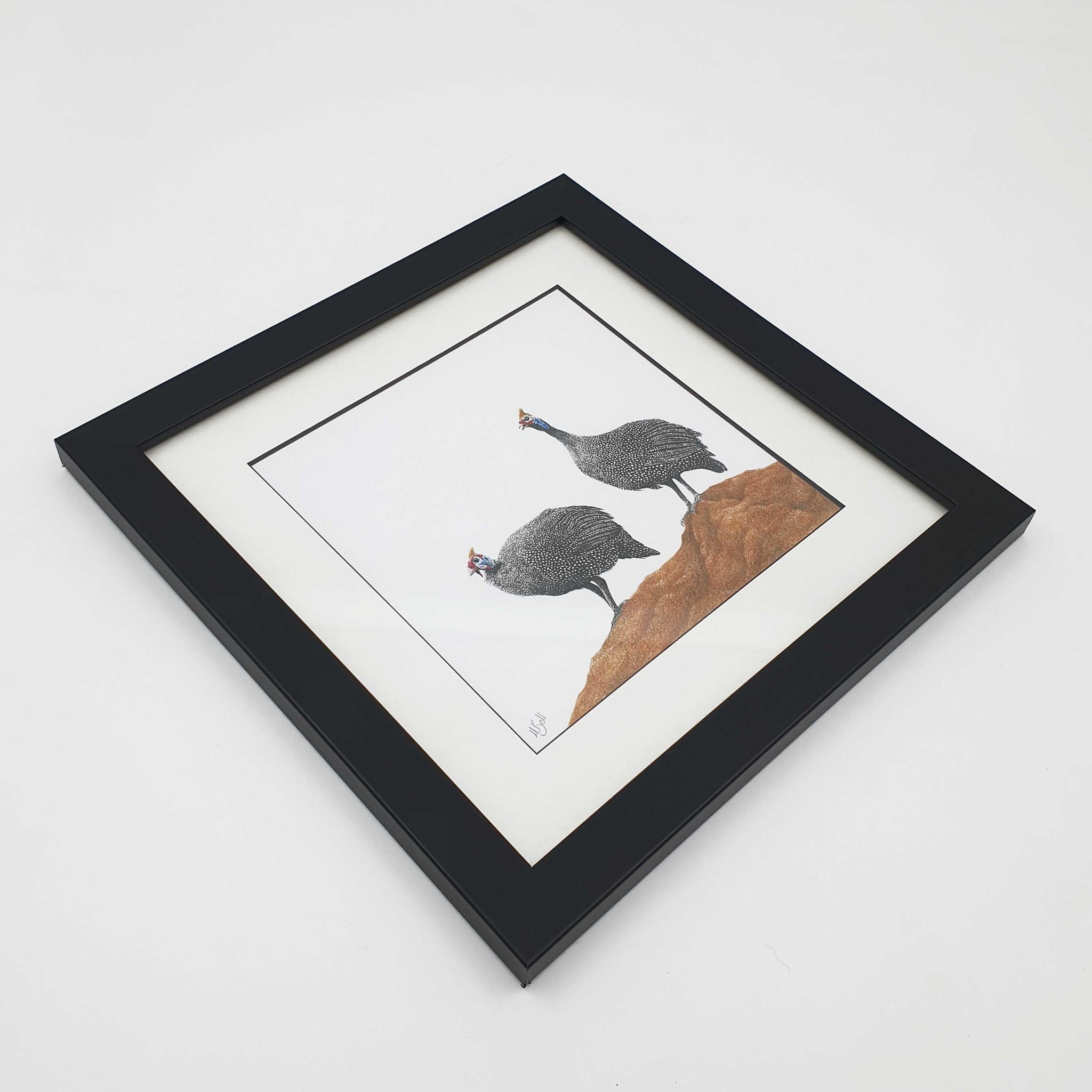 Framed guinea fowl artwork